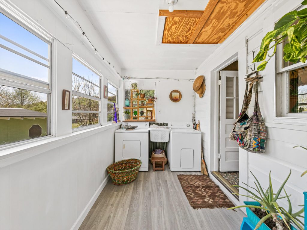 laundry and sunroom in Candler home for sale