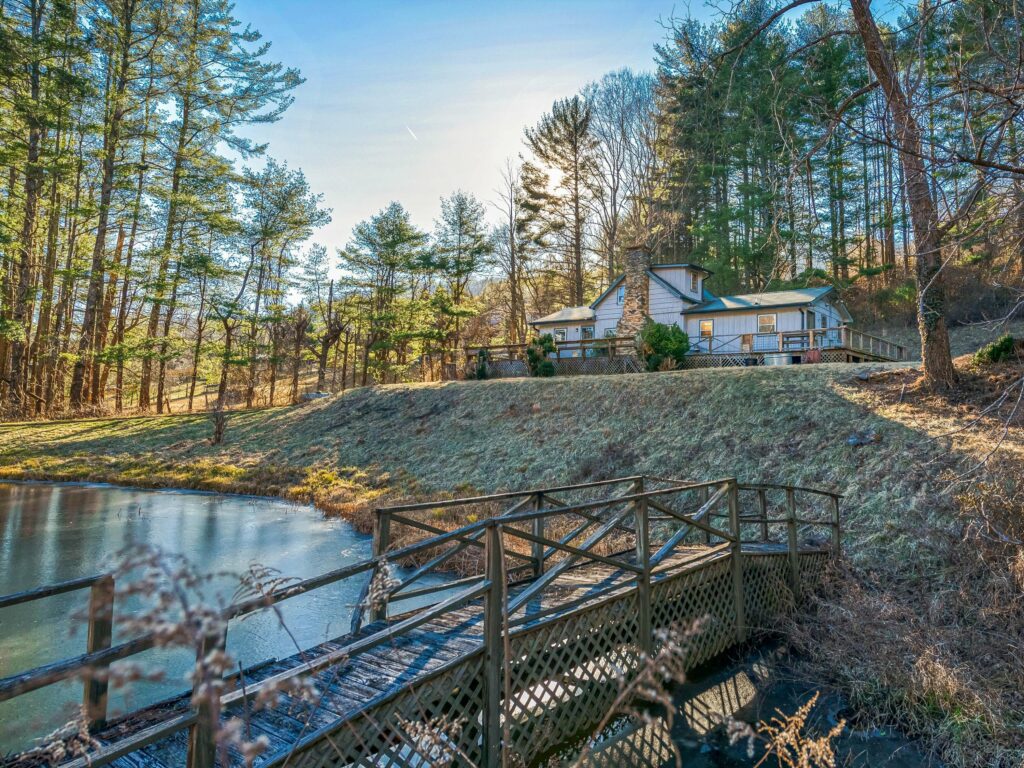 Mountain Homestead for Sale in Asheville's Riceville Area with pond