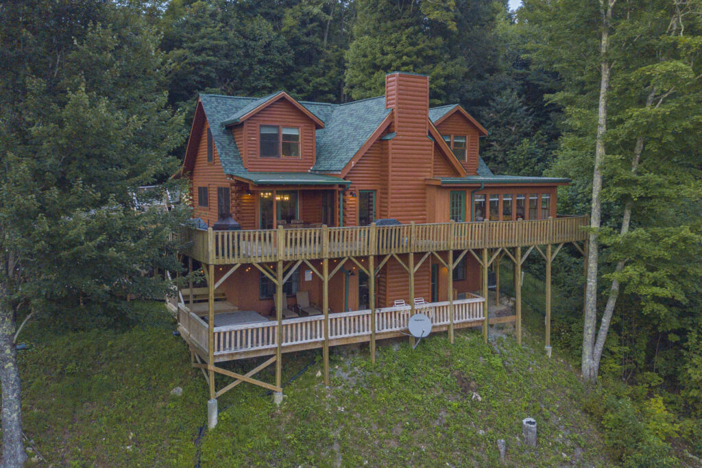 Income-Producing Wolf Ridge Cabin for Sale with beautiful decks and views