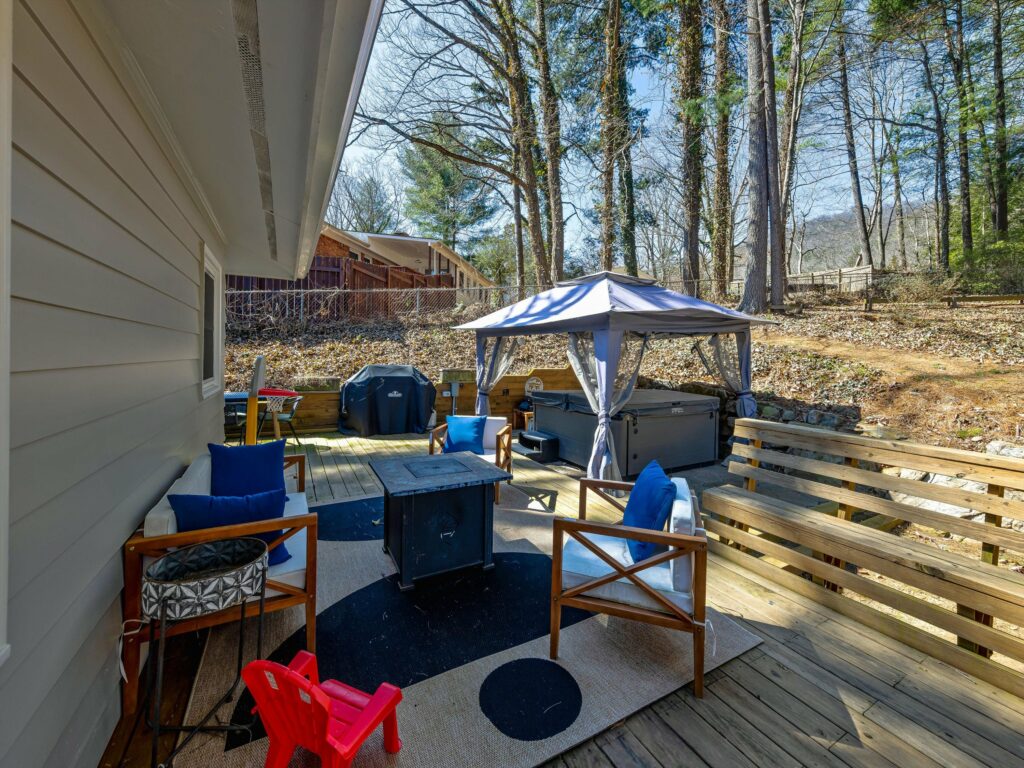backyard and hot tub and deck in Haw Creek
