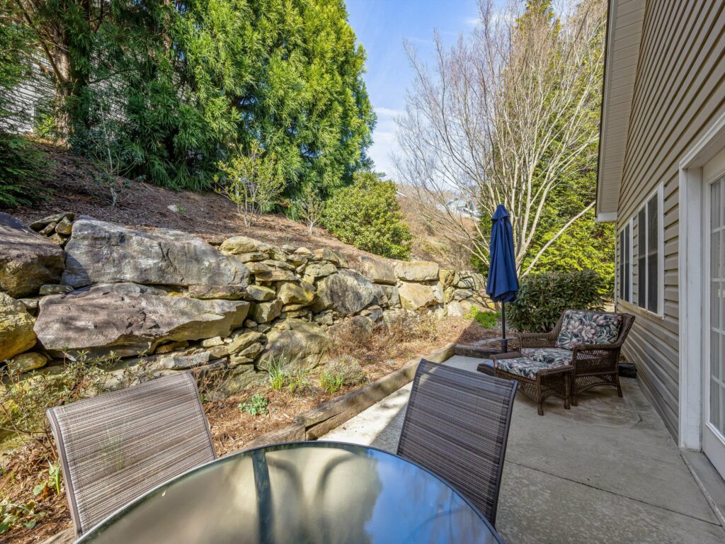 outdoor patio and beautiful yard in Move-In Ready Home in Asheville's Stonebridge Community