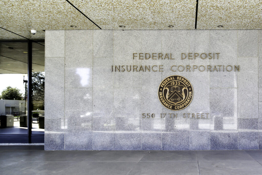 Washington D.C., USA - March 1, 2020: Entrance to The Federal Deposit Insurance Corporation (FDIC) in Washington DC., an federal agency insuring deposits in U.S. banks and thrifts in the event of bank failures.