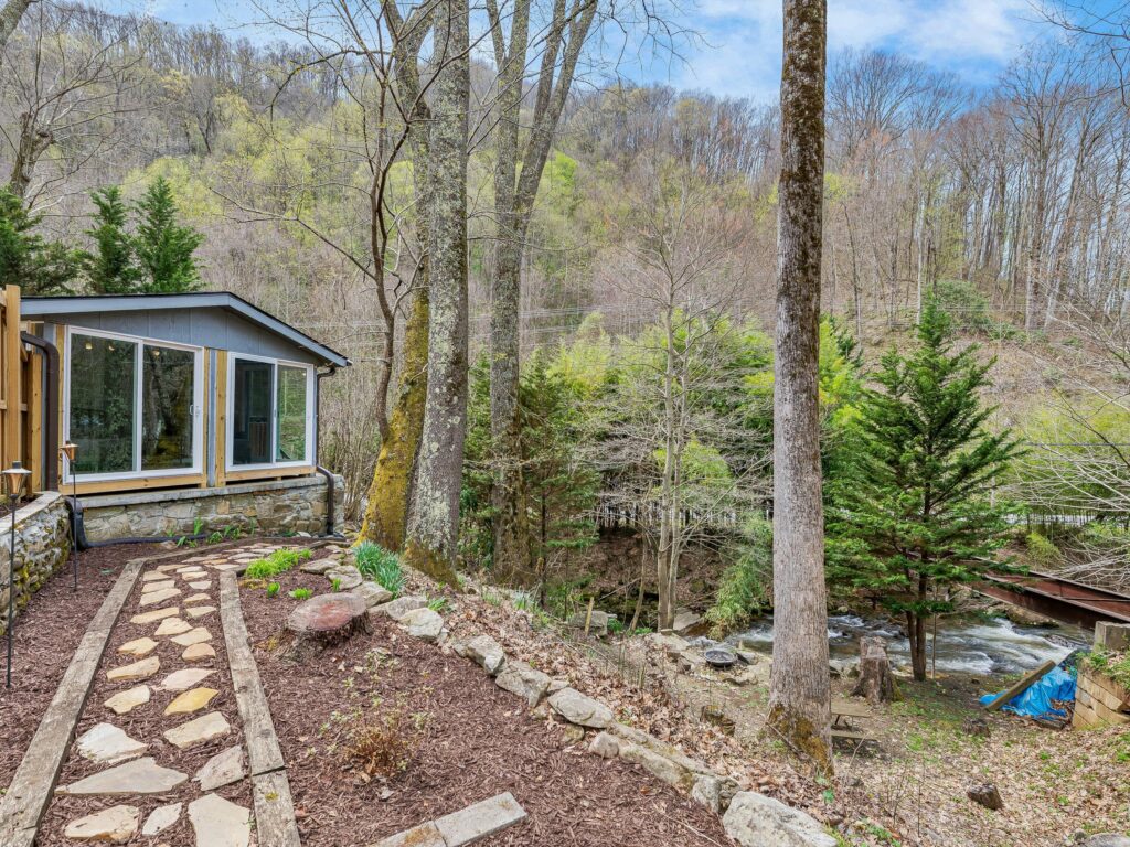 two houses and creek in Maggie Valley home for sale