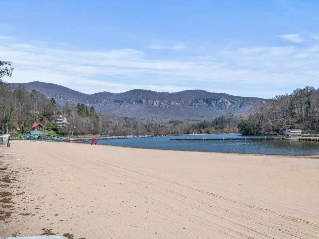 lot for sale in Lake Lure's gated Firefly Cove with community amenities and beach