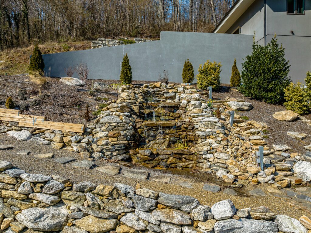 Contemporary Modern Masterpiece for Sale in North Asheville's Grove Park Cove waterfall