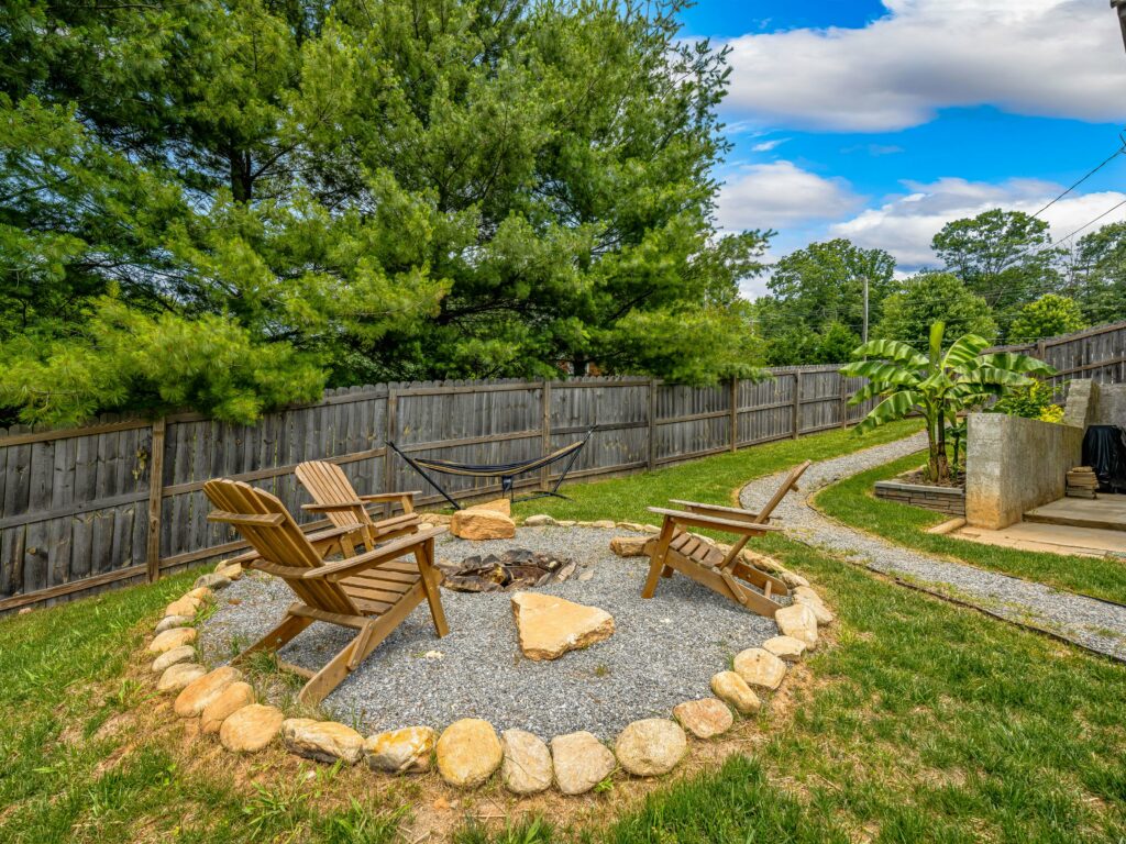 beautiful Asheville cottage for sale with beautiful backyard and firepit